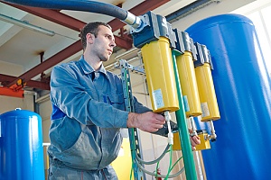 Water technician checking levels 