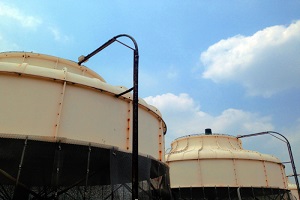 cooling tower in cloud and blue sky background on the rooftop