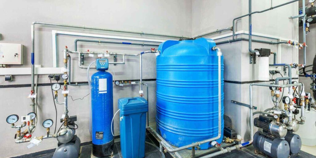 boiler water treatment system with storage tanks and multiple filters