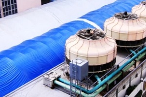 cooling tower with big blue and white plastic covers