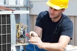 hvac engineer fixing issues in the system