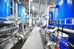 blue tanks in a industrial city water treatment boiler room