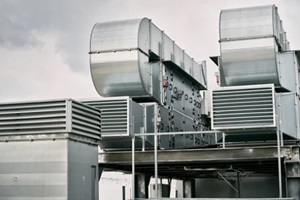 hvac condenser and compressor on the roof of the building