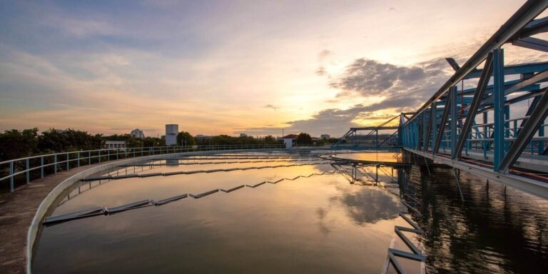 water treatment plant with sunrise