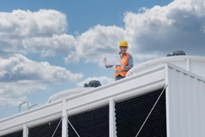 engineer inspecting cooling tower