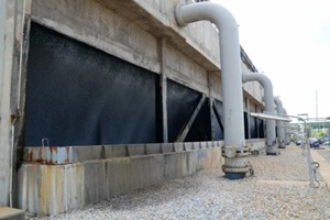 cooling tower and cooling fan blowing steam on the air in chemical plant